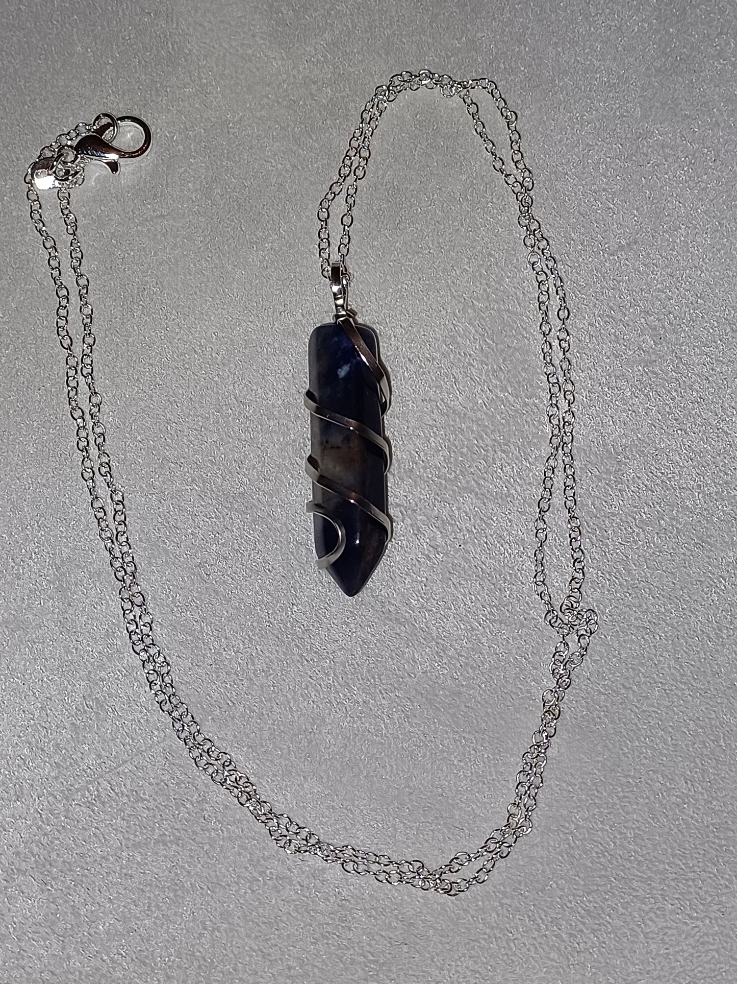 Sunset Sodalite Bullet Silver Wrapped Necklace