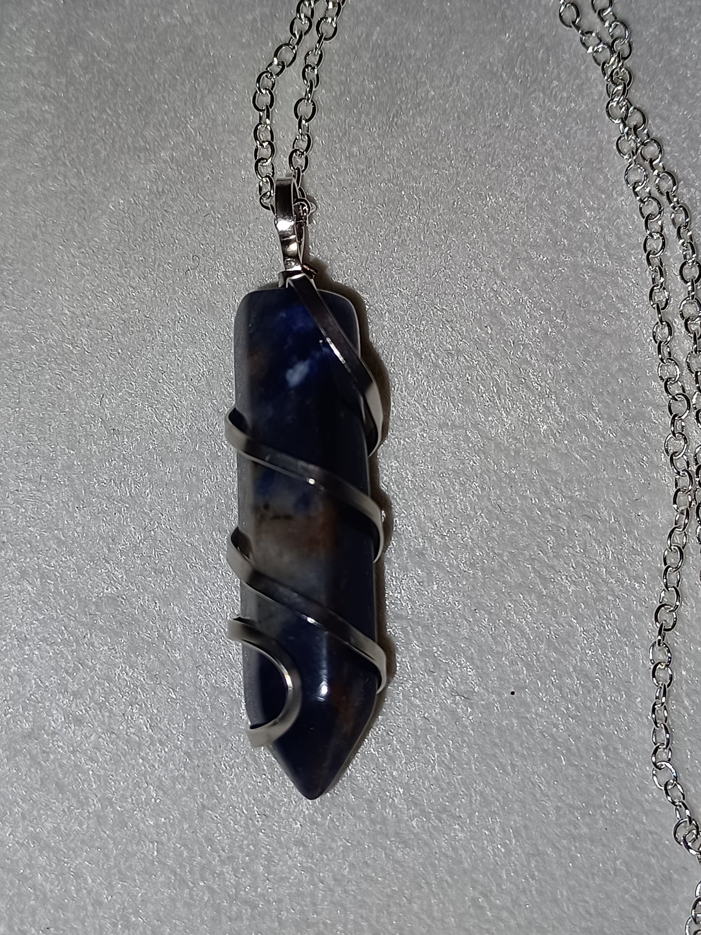 Sunset Sodalite Bullet Silver Wrapped Necklace